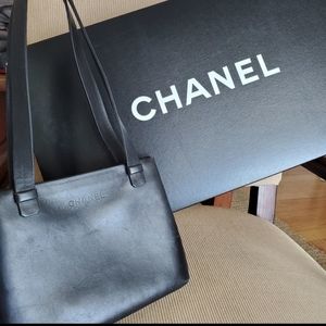 Authentic & unique Chanel bag: black leather. GUC.  Original owner original.